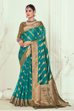 Load image into Gallery viewer, Organza Fabric Teal Color Coveted Weaving And Stone Work Saree
