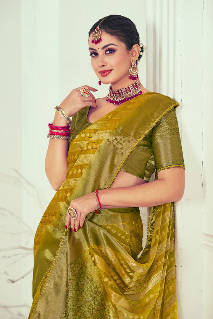 Organza Fabric Yellow Color Intriguing Weaving And Stone Work Saree