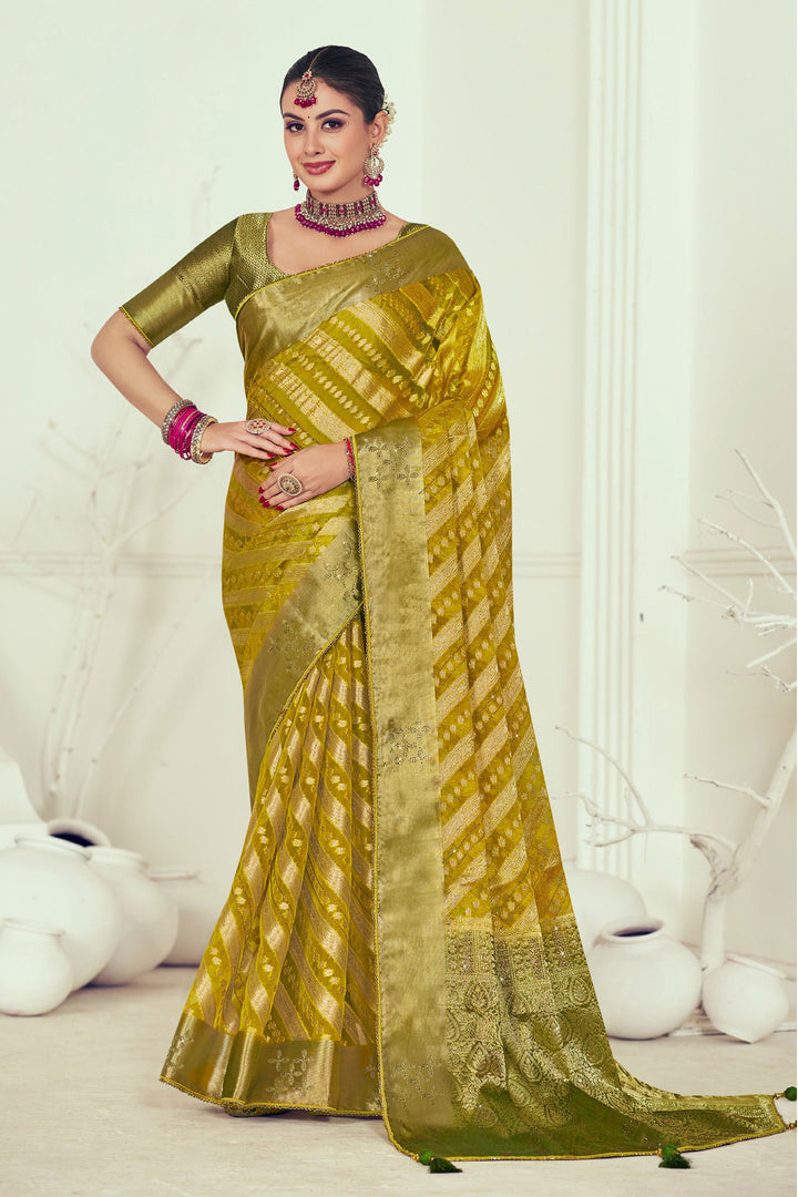 Organza Fabric Yellow Color Intriguing Weaving And Stone Work Saree