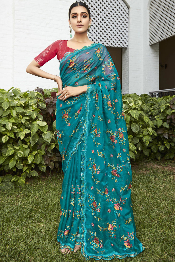 Party Style Embroidered and Stone Work Teal Color Magnificent Organza Saree
