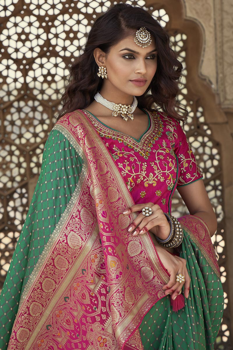 Green Color Puja Wear Elegant Weaving Work Silk Fabric Saree With Embroidered Blouse