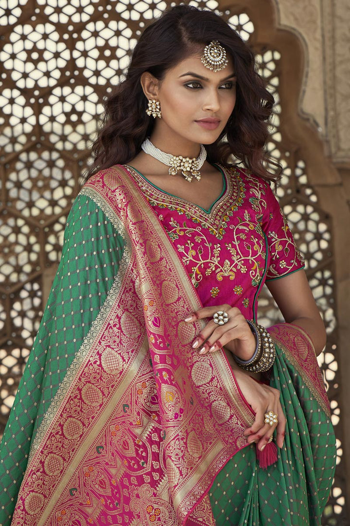 Green Color Puja Wear Elegant Weaving Work Silk Fabric Saree With Embroidered Blouse