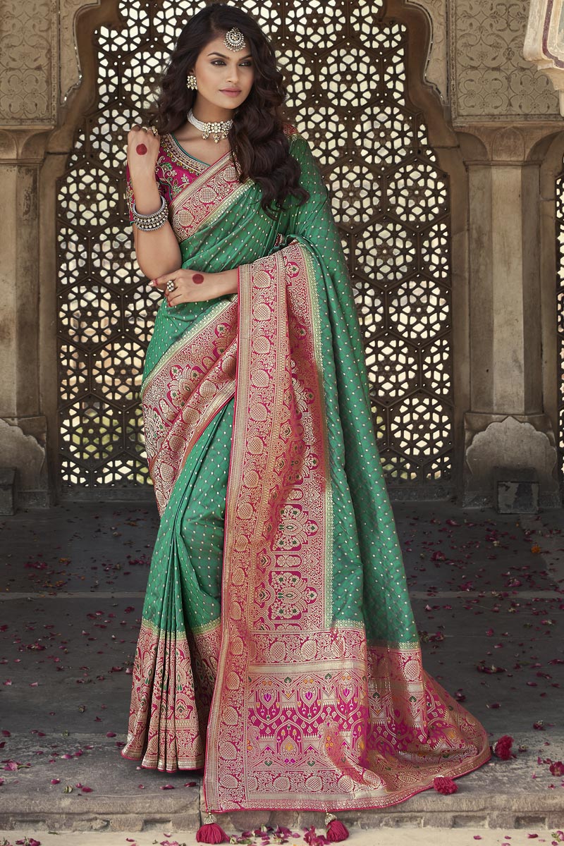 Green Color Puja Wear Elegant Weaving Work Silk Fabric Saree With Embroidered Blouse