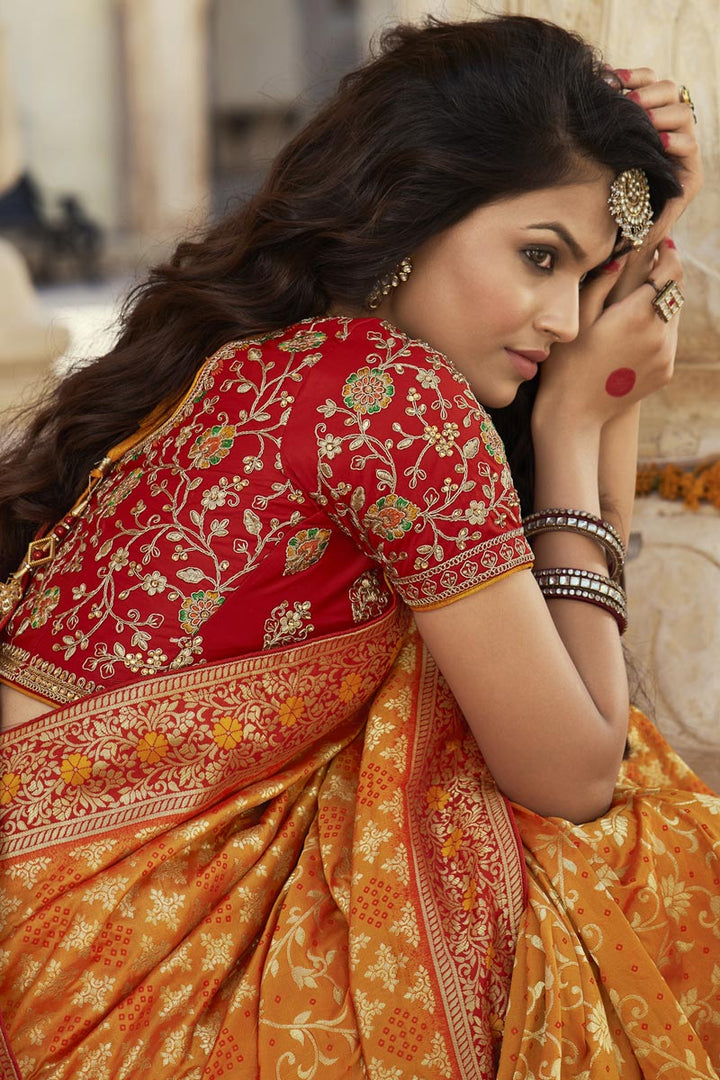 Puja Wear Silk Fabric Elegant Yellow Color Weaving Work Saree With Embroidered Blouse
