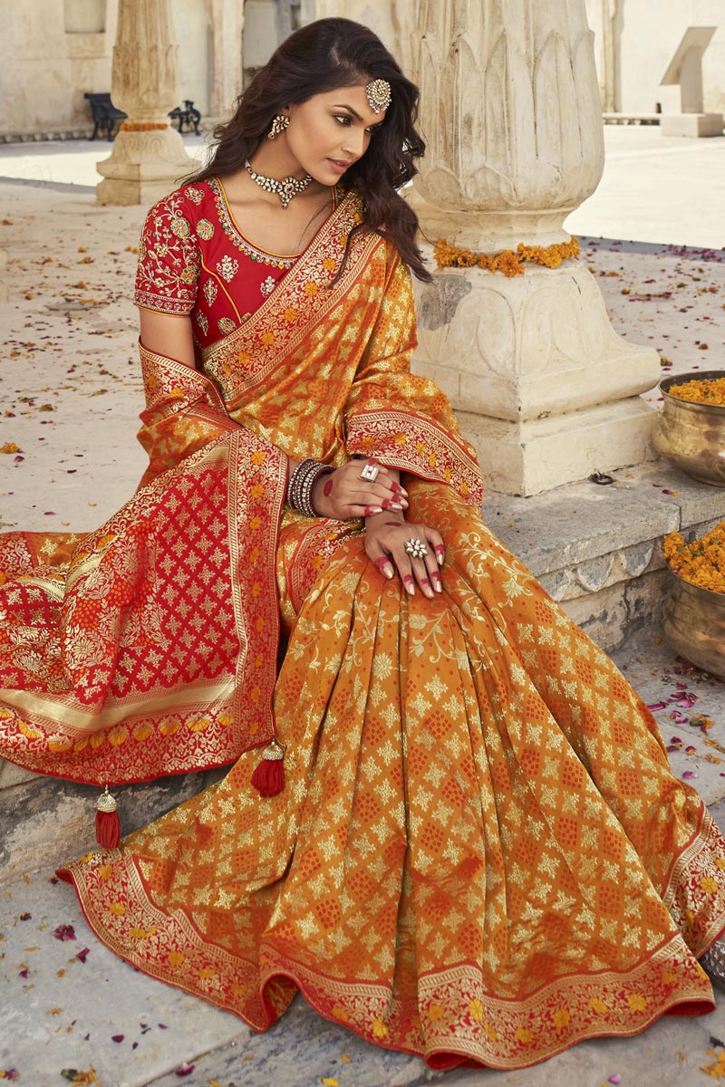 Puja Wear Silk Fabric Elegant Yellow Color Weaving Work Saree With Embroidered Blouse
