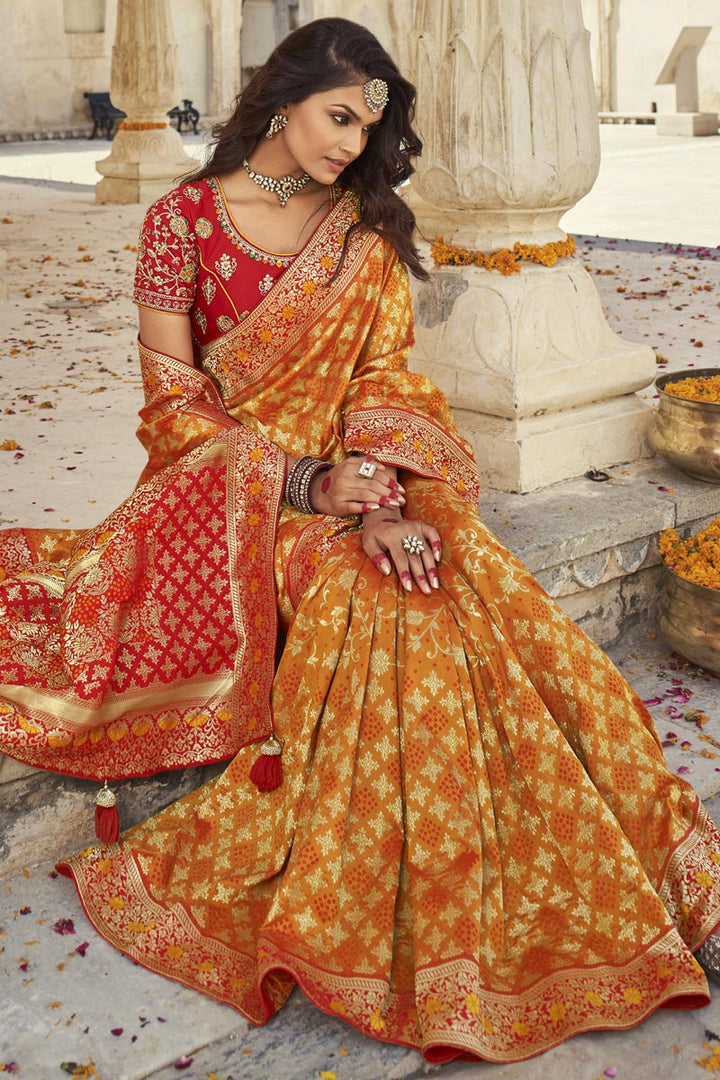 Puja Wear Silk Fabric Elegant Yellow Color Weaving Work Saree With Embroidered Blouse