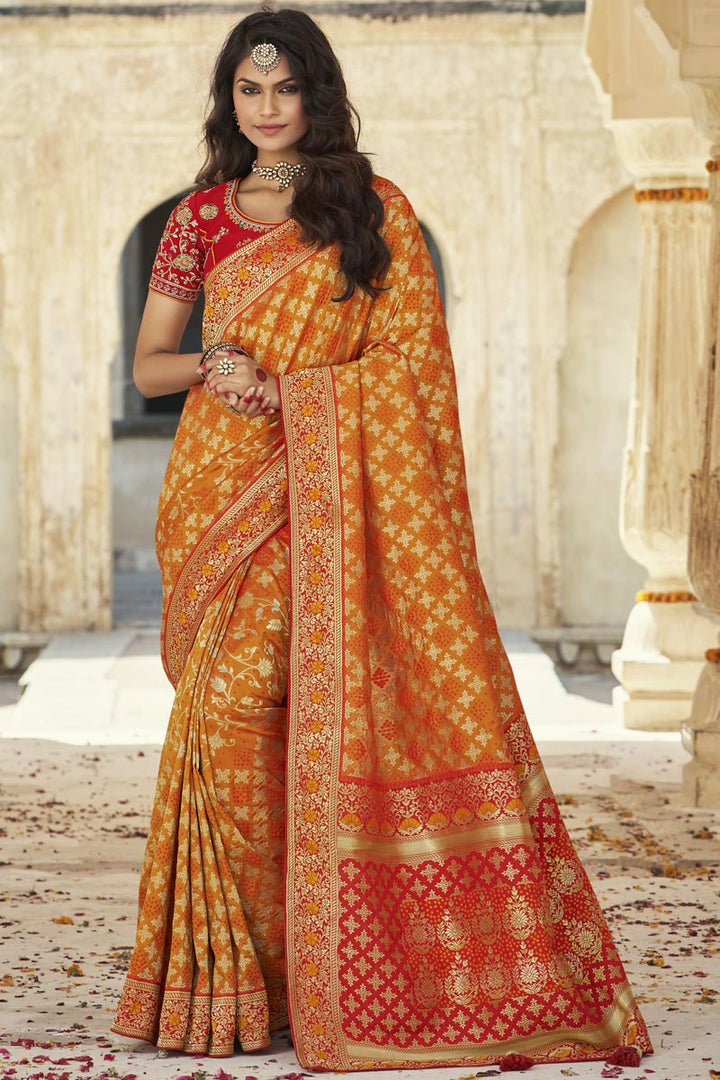 Puja Wear Silk Fabric Elegant Yellow Color Weaving Work Saree With Embroidered Blouse