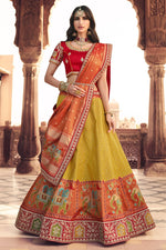Load image into Gallery viewer, Yellow Color Wedding Wear Silk Fabric Embroidered Lehenga Choli
