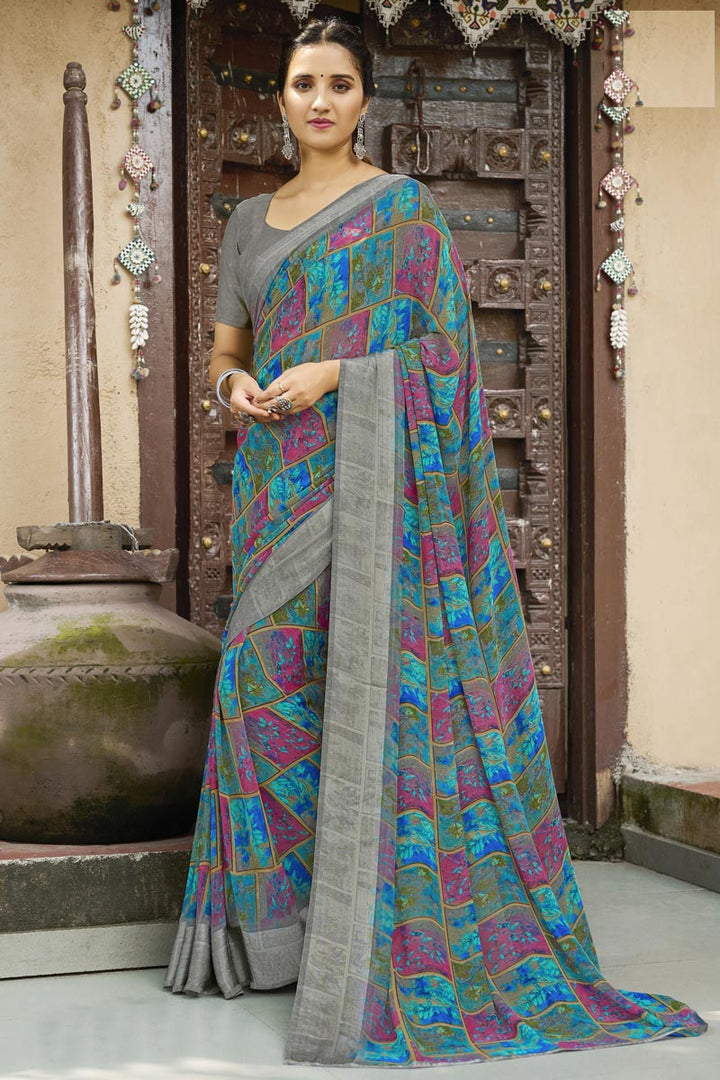 Remarkable Cyan Color Georgette Fabric Printed Saree