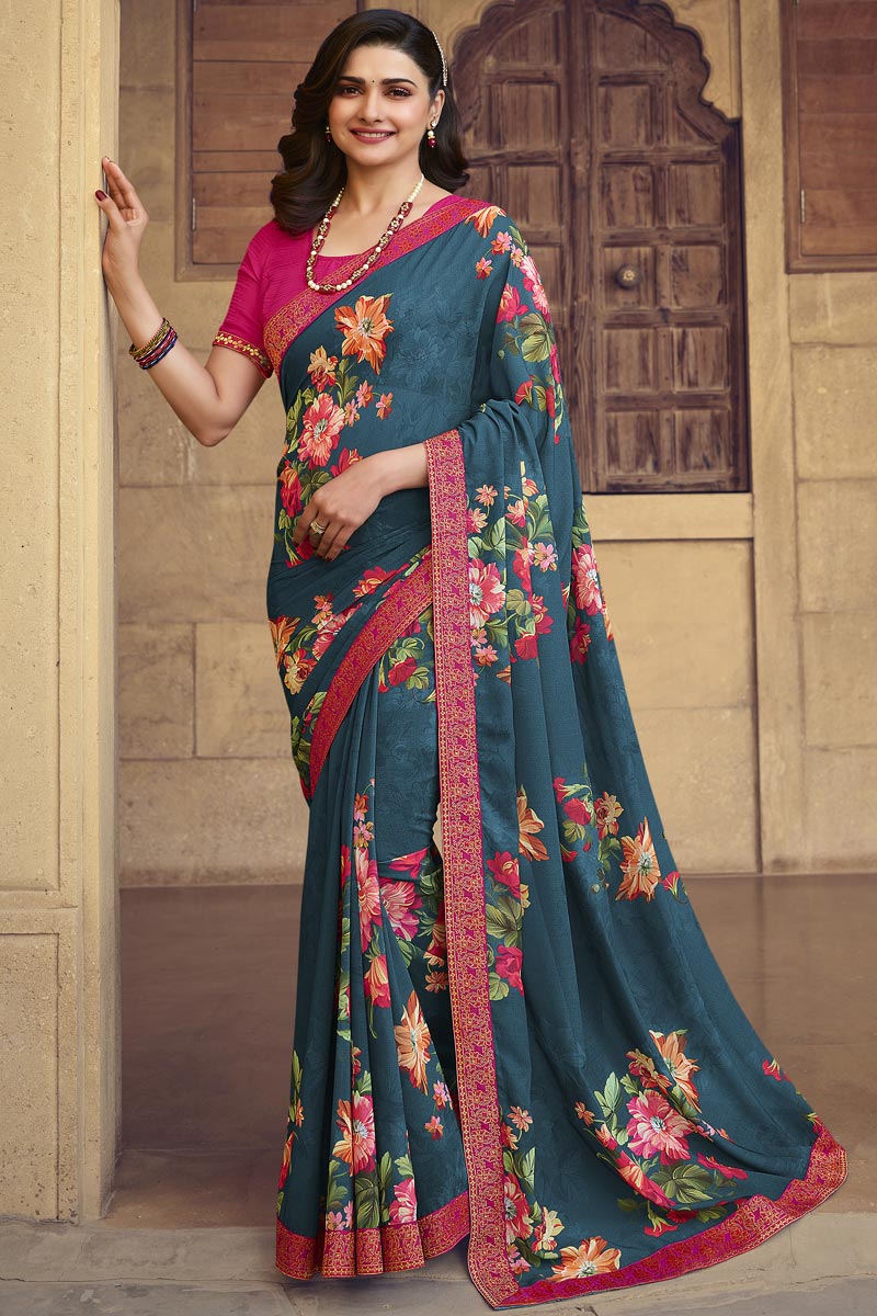 Prachi Desai Georgette Fabric Daily Wear Fancy Teal Color Printed Saree