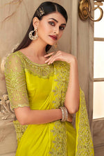 Load image into Gallery viewer, Blissful Function Wear Georgette Silk Fabric Yellow Color Embroidered Work Saree
