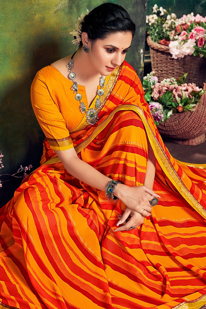 Daily Wear Georgette Fabric Printed Saree In Orange Color