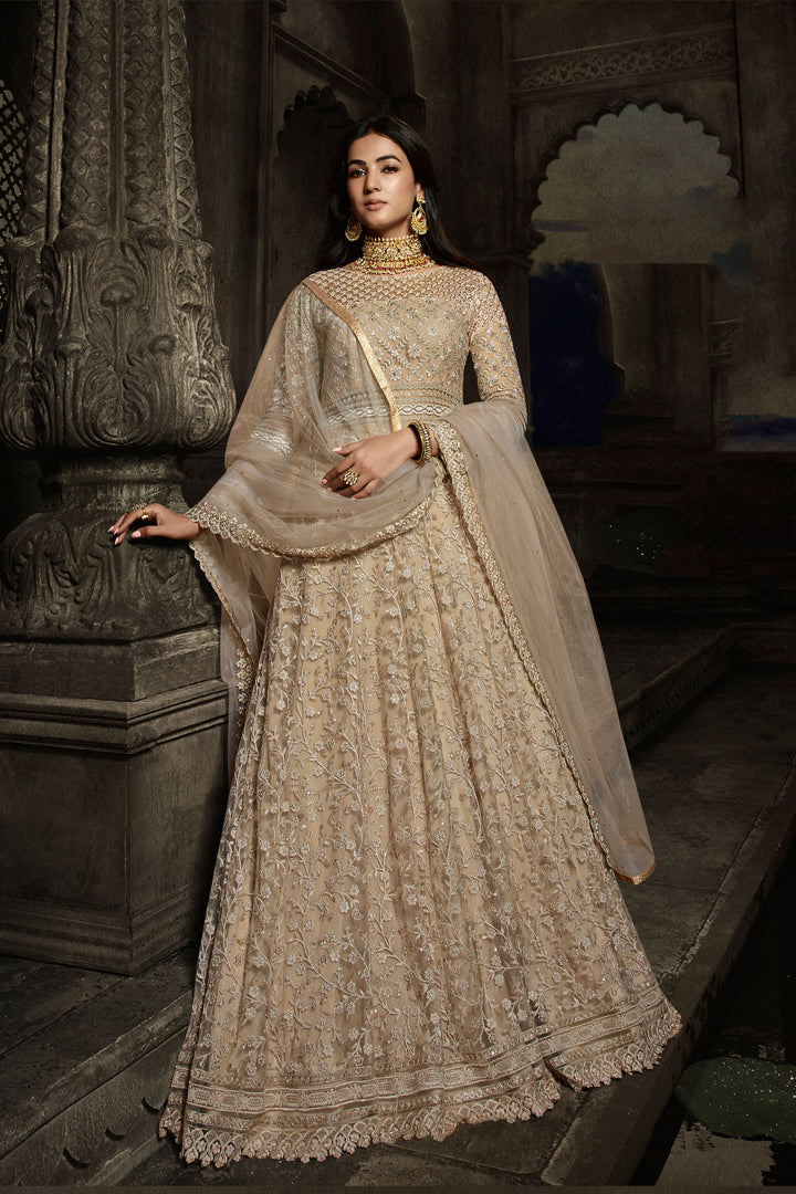 Sonal Chauhan Beige Color Glittering Net Fabric Wedding Wear Anarkali Suit
