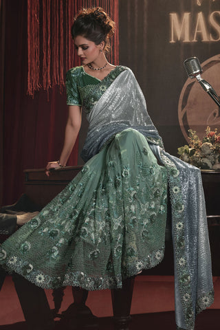 Radiant Sea Green Color Net Fabric Embroidery Work Saree With Party Look Blouse