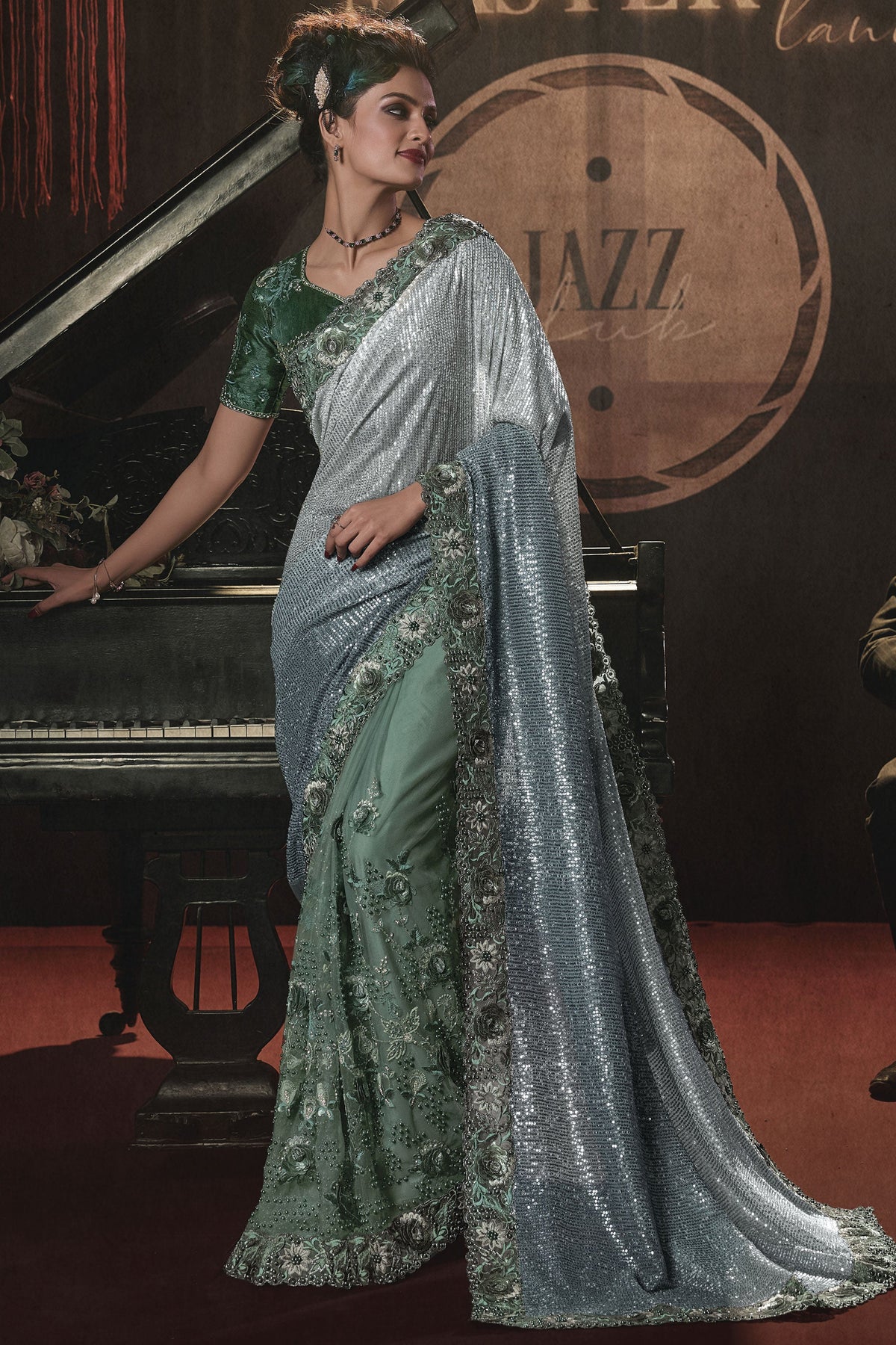 Radiant Sea Green Color Net Fabric Embroidery Work Saree With Party Look Blouse