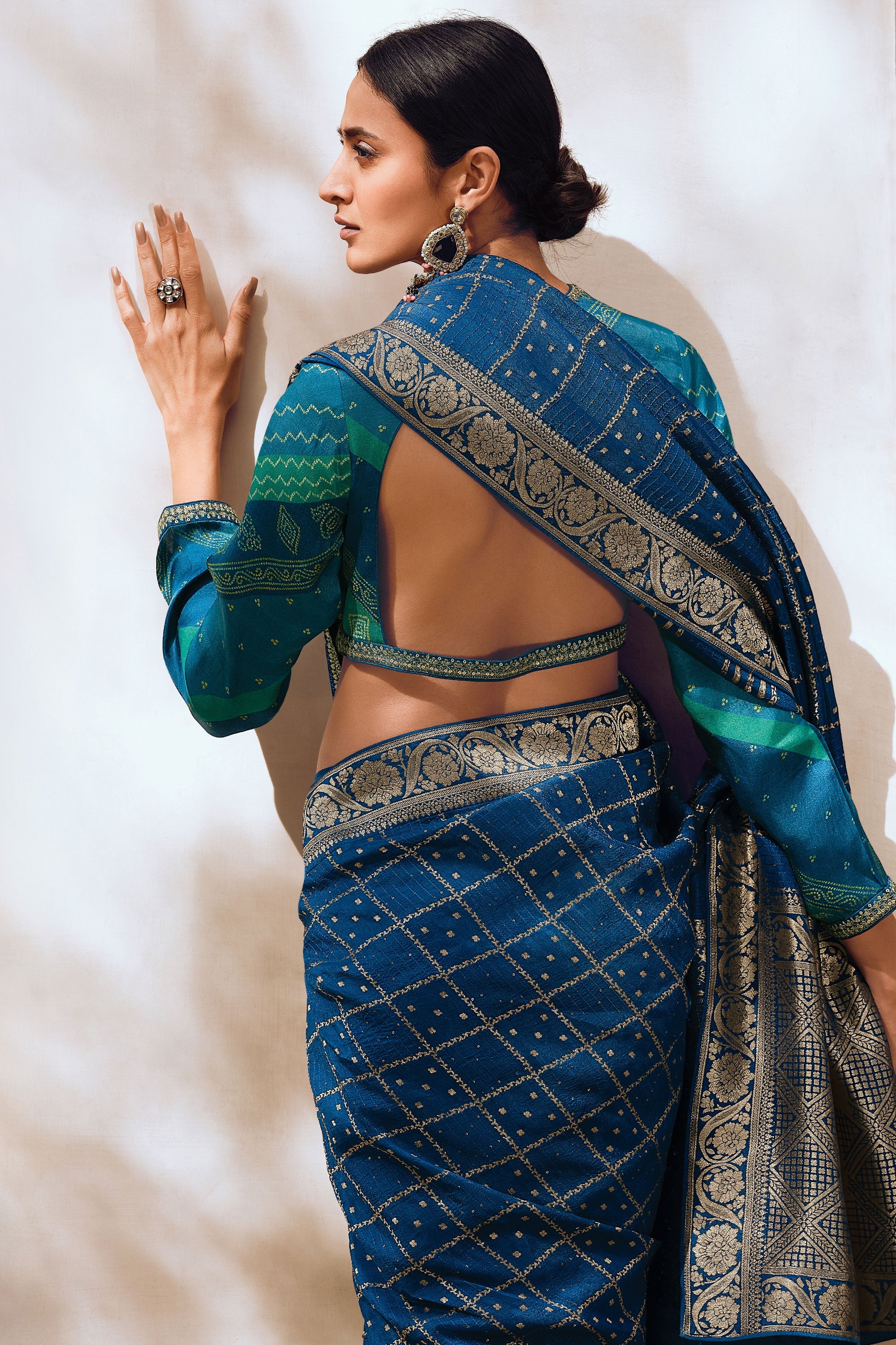 Weaving Designs On Teal Color Party Style Art Silk Saree