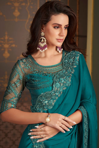 Larissa Bonesi Satin Silk Fabric Teal Color Fantastic Border Work Saree