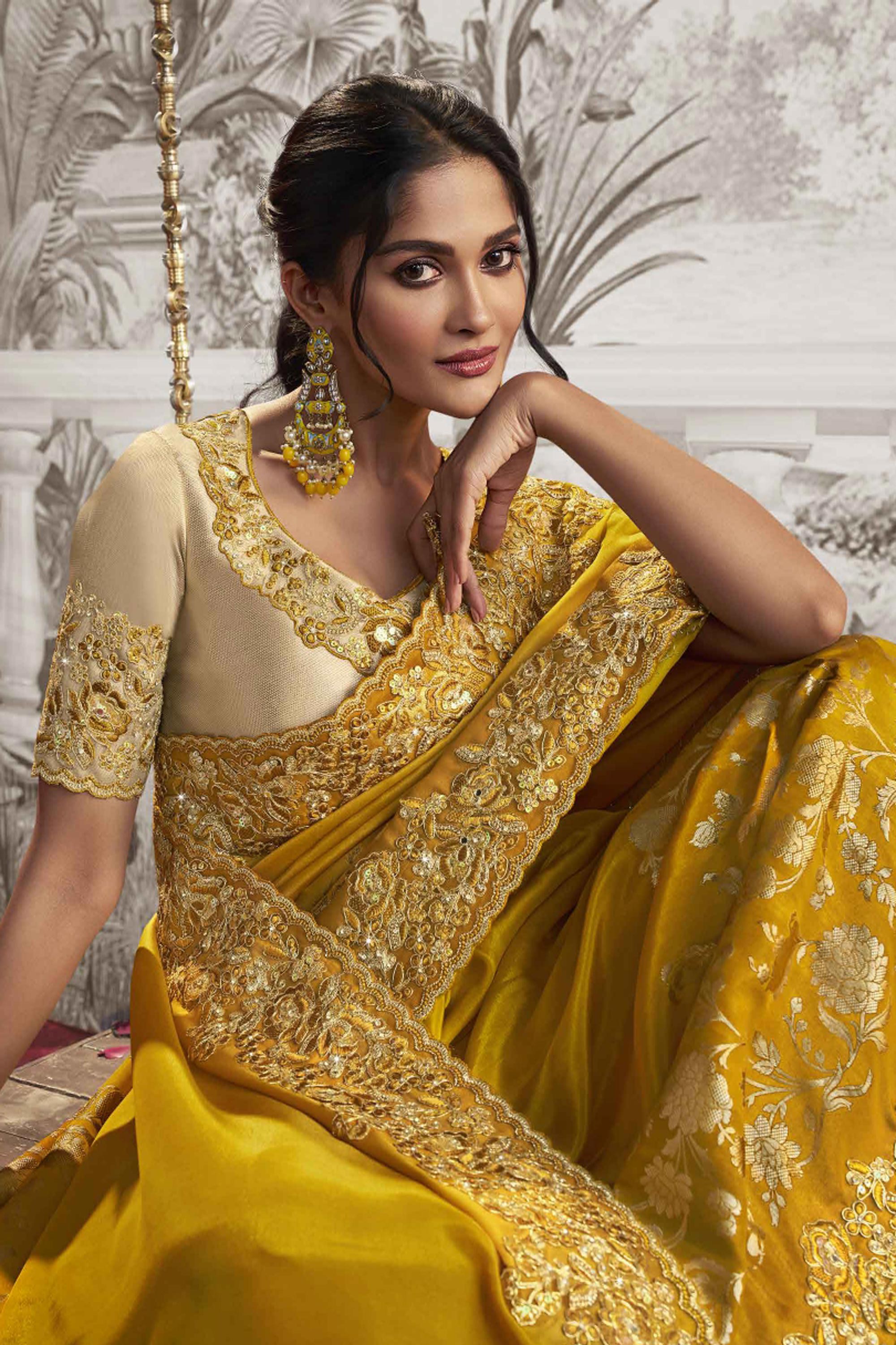 Appealing Heavy Embroidery Work Fancy Fabric Yellow Saree With Party Look Blouse