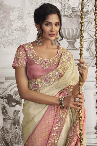 Heavy Embroidery Work Engaging Beige Color Fancy Fabric Saree With Party Look Blouse