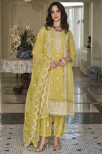 Load image into Gallery viewer, Appealing Embroidered Work On Organza Fabric Salwar Suit In Yellow Color

