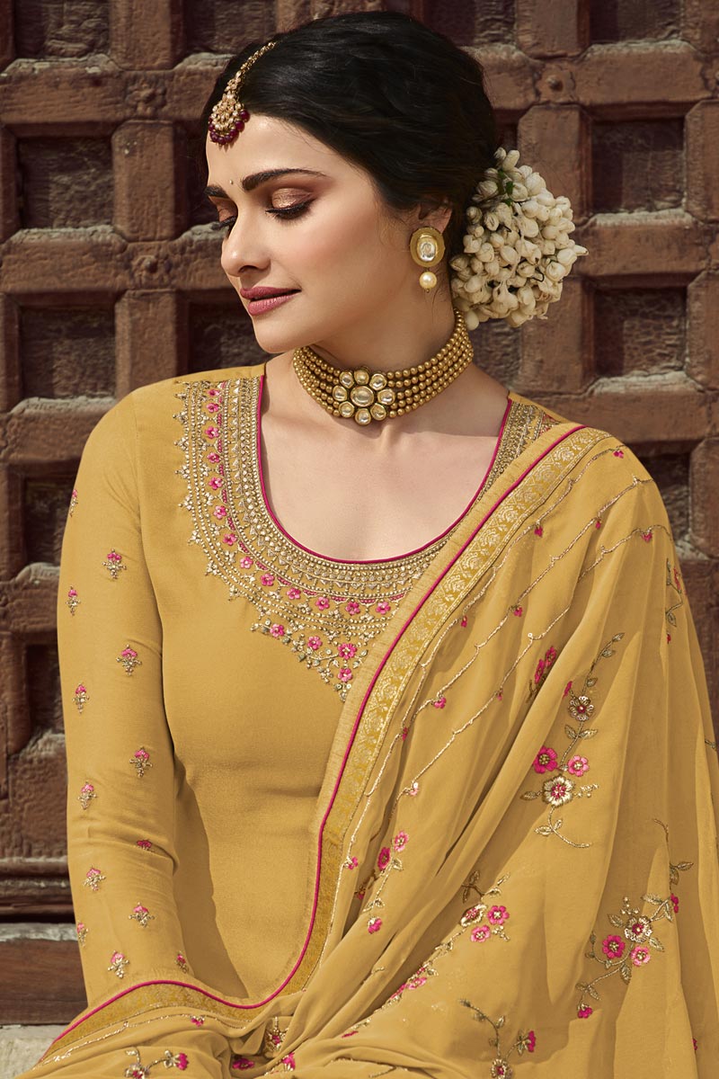 Prachi Desai Georgette Fabric Wedding Wear Embroidered Palazzo Suit In Yellow Color