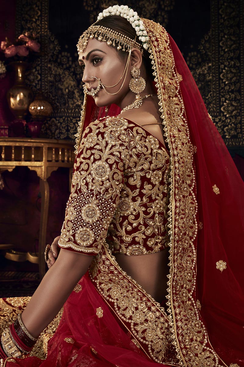 Magnetic Maroon Color Heavy Embroidered Velvet Bridal Lehenga Choli