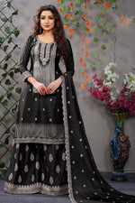 Load image into Gallery viewer, Party Wear Chinon Fabric Embroidered Black Color Charming Palazzo Suit
