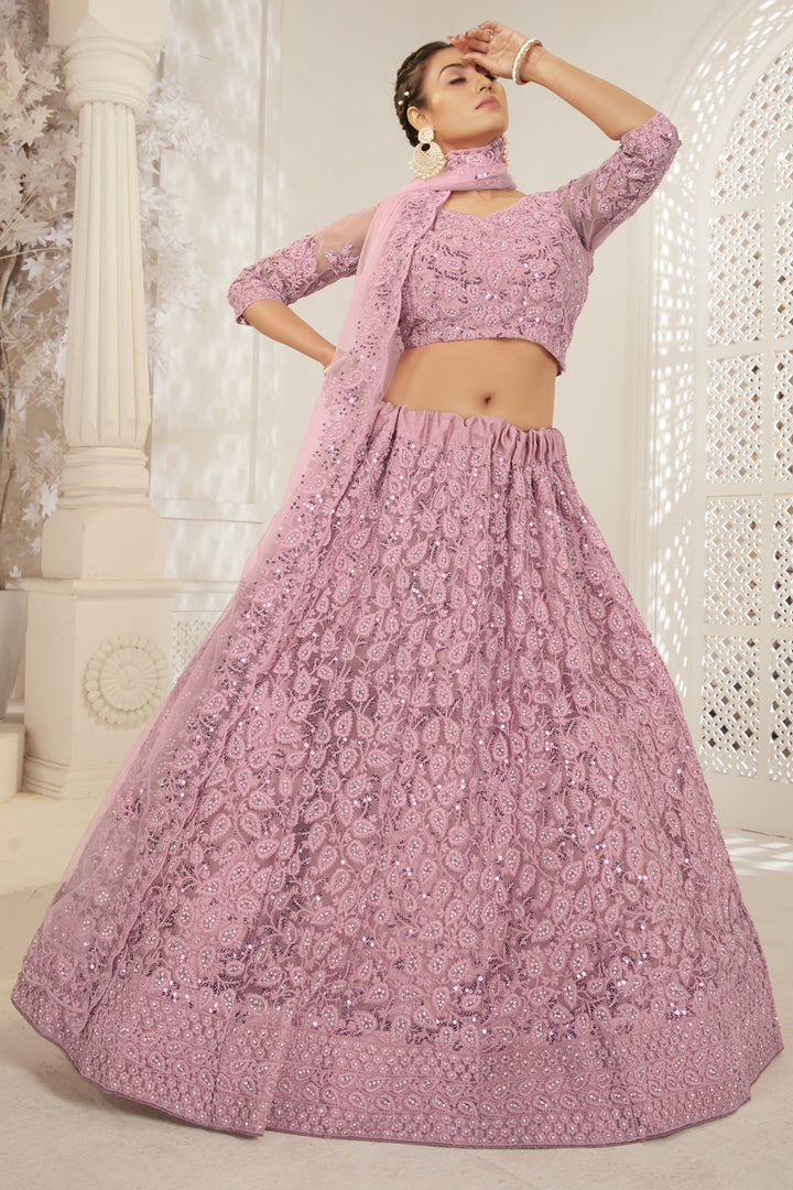 Designer Embroidered Wedding Wear Lehenga Choli In Pink Color Net Fabric