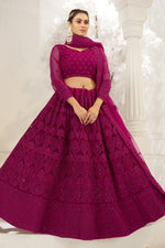 Load image into Gallery viewer, Embroidered Wedding Wear Lehenga Choli In Wine Color Net Fabric
