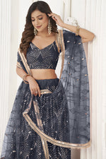 Load image into Gallery viewer, Ingenious Sangeet Wear Navy Blue Color Net Fabric Lehenga Choli
