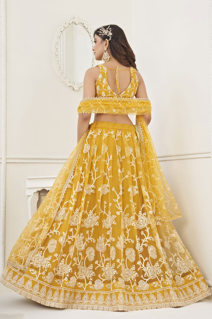 Alluring Yellow Designer Embroidered Lehenga Choli In Net Fabric With Blouse