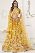 Load image into Gallery viewer, Alluring Yellow Designer Embroidered Lehenga Choli In Net Fabric With Blouse