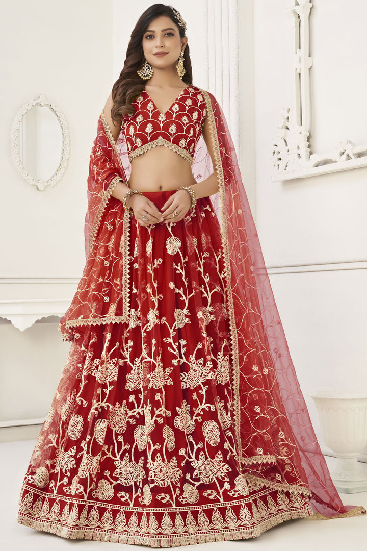 Wedding Wear Embroidered Net Lehenga In Red With Ravishing Blouse