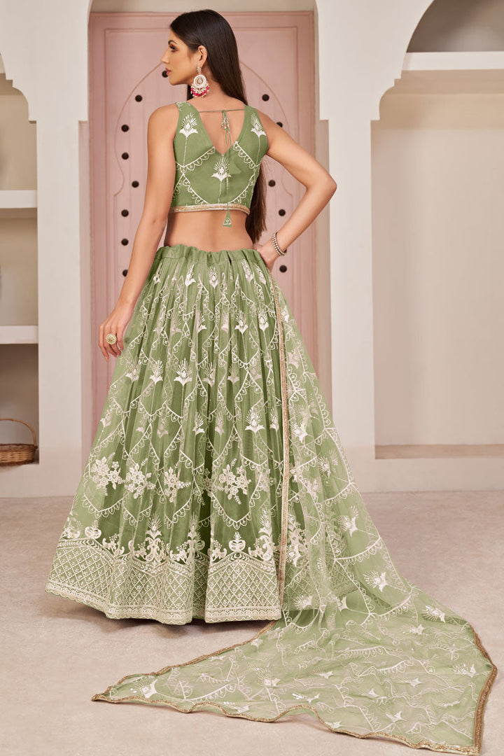 Net Fabric Embroidered Work Wonderful Lehenga In Green Color
