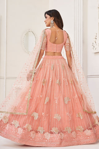 Embroidered Peach Net Fabric Sangeet Wear Lehenga Choli