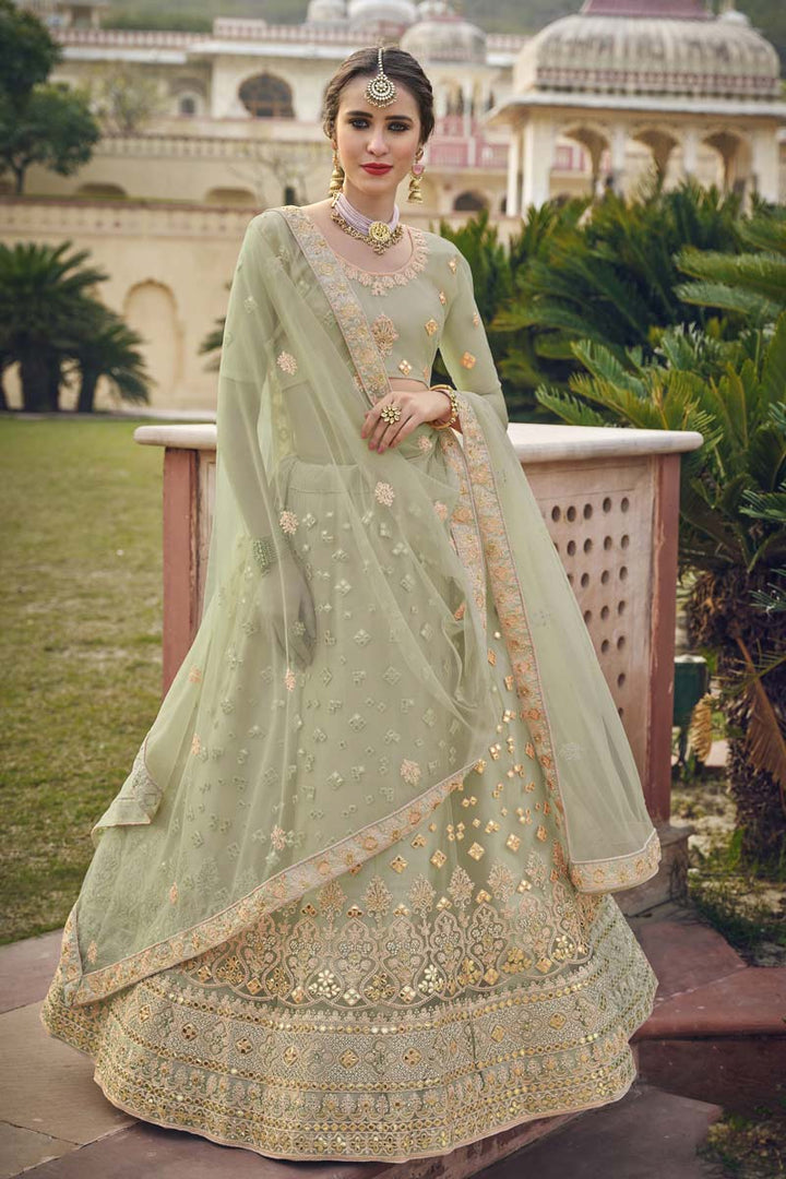 Sangeet Wear Embroidered Work Net Fabric Lehenga In Dazzling Sea Green Color
