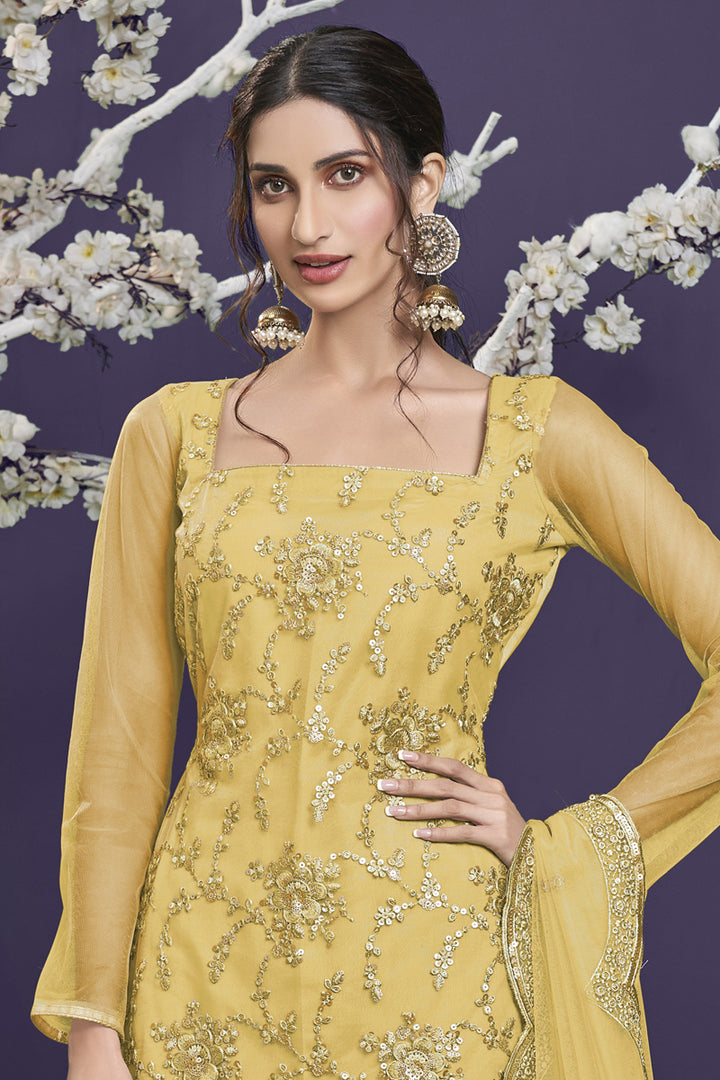 Net Fabric Party Wear Yellow Color Embroidered Designer Sharara Suit