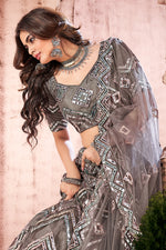 Load image into Gallery viewer, Wedding Wear Dark Beige Color Net Fabric Fancy Work Lehenga Choli
