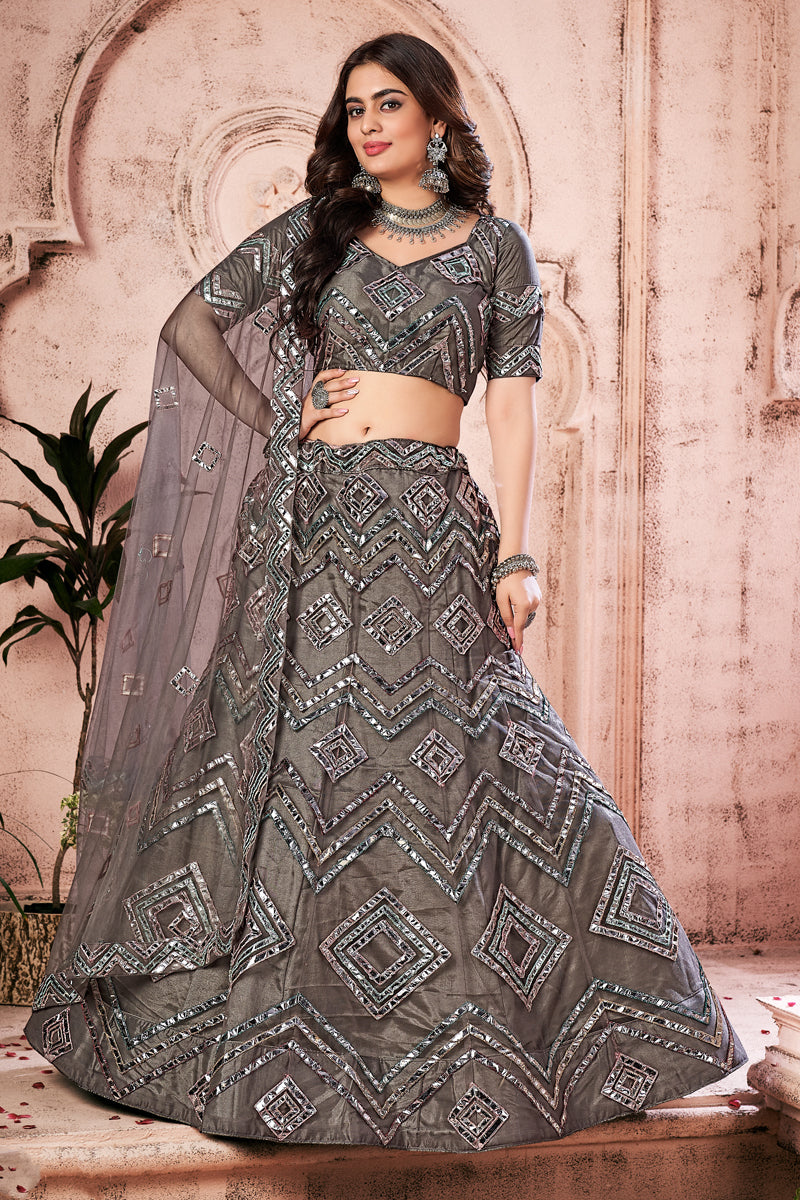 Wedding Wear Dark Beige Color Net Fabric Fancy Work Lehenga Choli