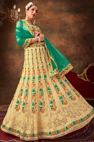 Beige Color Net Fabric Lehenga Choli With Embroidered Work