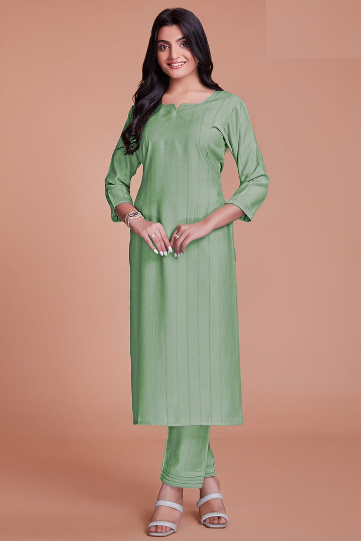 Charming Green Color Viscose Fabric Kurti With Pant