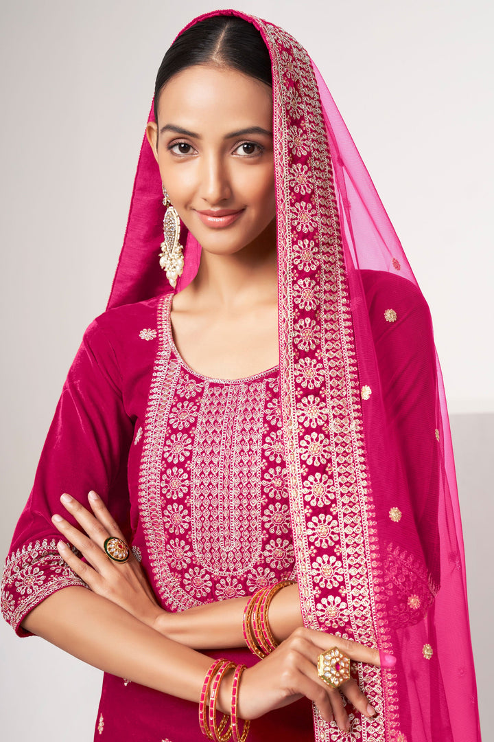 Rani Color Embroidered Festive Wear Salwar Suit In Velvet Fabric