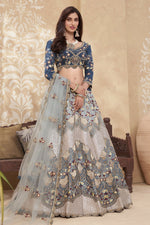 Load image into Gallery viewer, Beige Color Silk Fabric Designer Embroidered Wedding Wear Lehenga Choli
