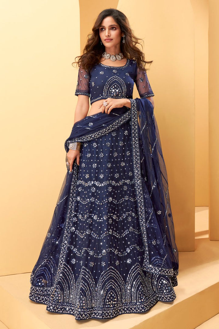 Navy Blue Color Embroidered Wedding Wear Lehenga Choli In Net Fabric