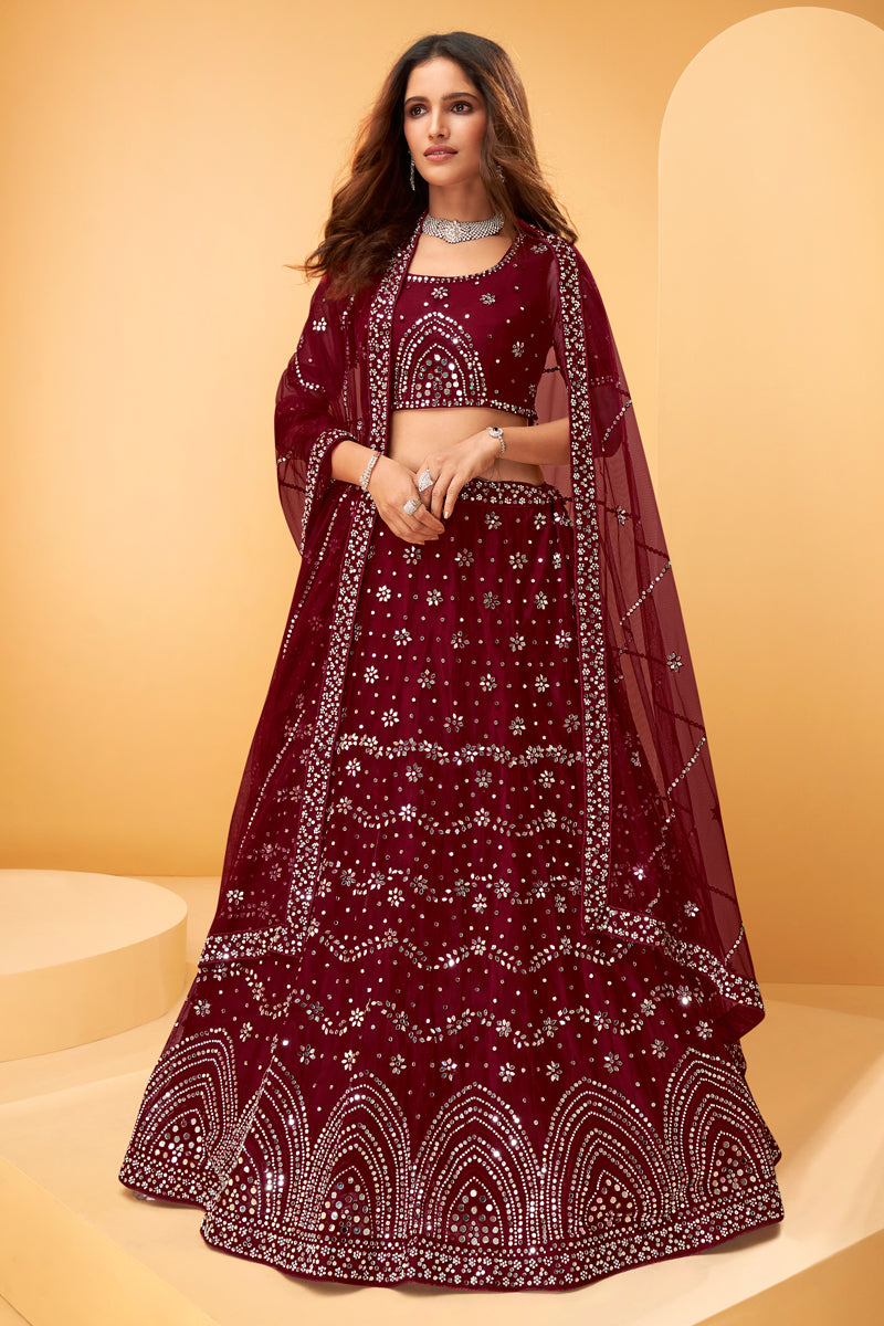 Wedding Wear Net Fabric Embroidered Lehenga Choli In Maroon Color