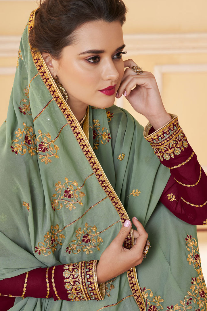 Georgette Maroon Color Party Wear Embroidered Fancy Palazzo Suit