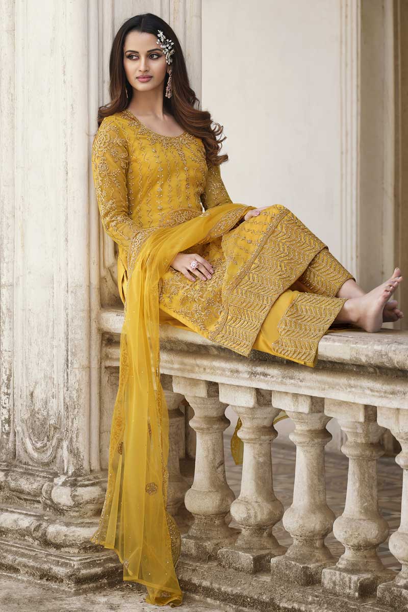 Party Wear Yellow Color Net Fabric Palazzo Suit With Fascinating Embroidered Work