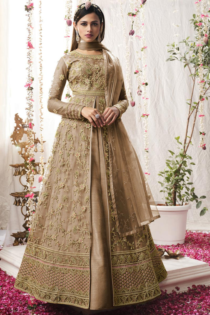 Fetching Net Fabric  Embroidered Anarkali Suit In Chikoo Color