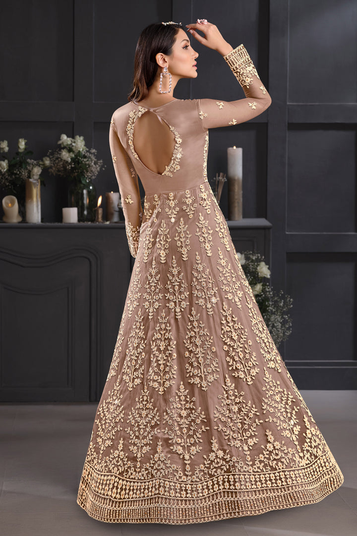 Net Fabric Embroidered Festive Wear Anarkali Salwar Kameez In Chikoo Color