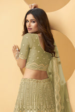 Load image into Gallery viewer, Embroidered Wedding Wear Designer Lehenga Choli In Beige Color Net Fabric
